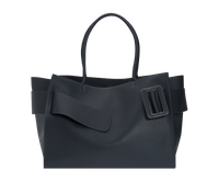 Large, blue, soft leather bag made with natural grain calfskin. Features an unfastened, oversized buckle and twin handles.