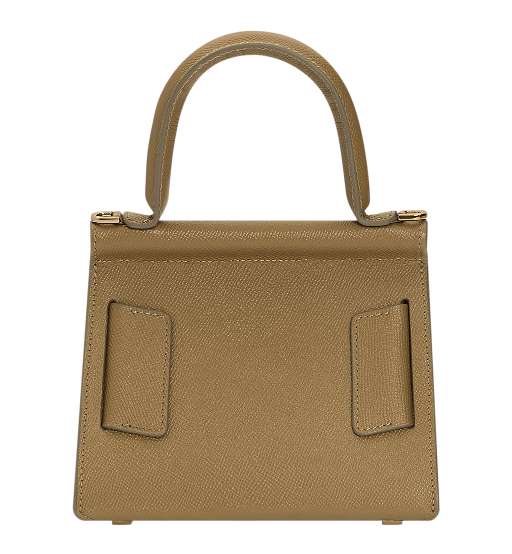 Brown, grained leather, structured handbag with an oversized gold buckle, single carry handle, carry strap, and front flap closure.