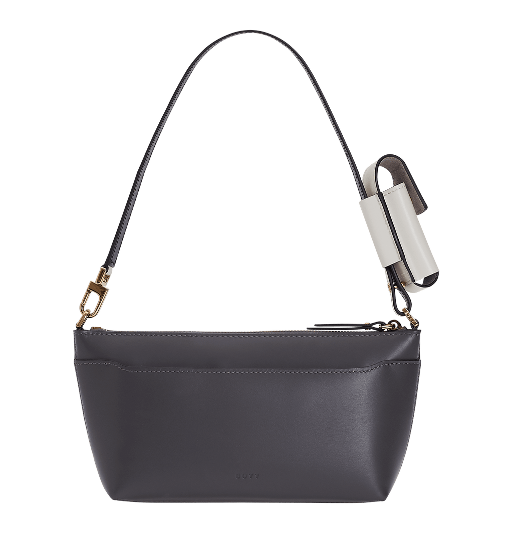 Small, shoulder bag with a large leather buckle on the front, Made with smooth calfskin leather.