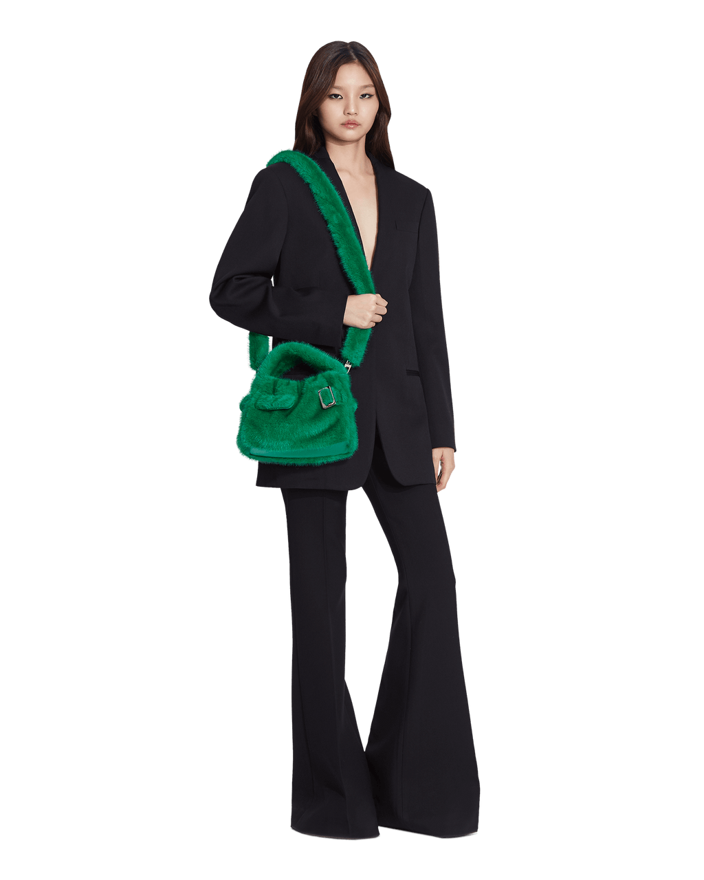 Rectangular green minky pouch with a metal buckle and, a belt, and a shoulder strap.