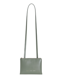 Celadon green BOYY DUPLÉ shoulder/crossbody travel bag in boxcalf leather, polenta yellow goatskin lining, two compartments with gold and silver zippers