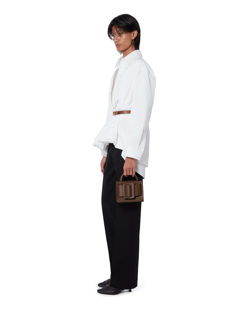 Mocha Brown BOYY BOBBY 18 handbag crafted from palmellato calfskin leather with suede lining. Features a structured silhouette, detachable shoulder strap, and an oversized belt and buckle closure on model