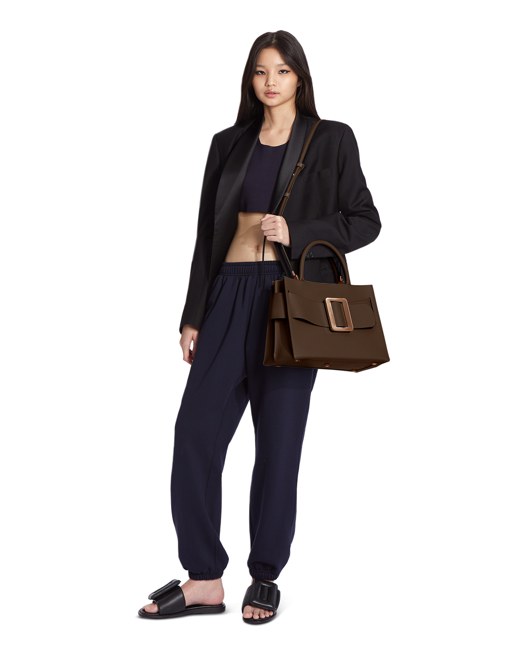 Mocha Brown BOYY BOBBY 32 Power Bag handbag crafted from palmellato calfskin leather with suede lining. Features a structured silhouette, detachable shoulder strap, and an oversized belt and buckle closure on model