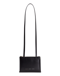 Black BOYY DUPLÉ shoulder/crossbody travel bag in boxcalf leather, emerald green goatskin lining, two compartments with gold and silver zippers