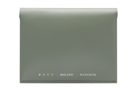 Celadon green box calf leather passport case with yellow goat skin lining, four internal slots, and a seamless single-piece design. The text “BOYY MILANO BANGKOK” is embossed in gold and silver on the front