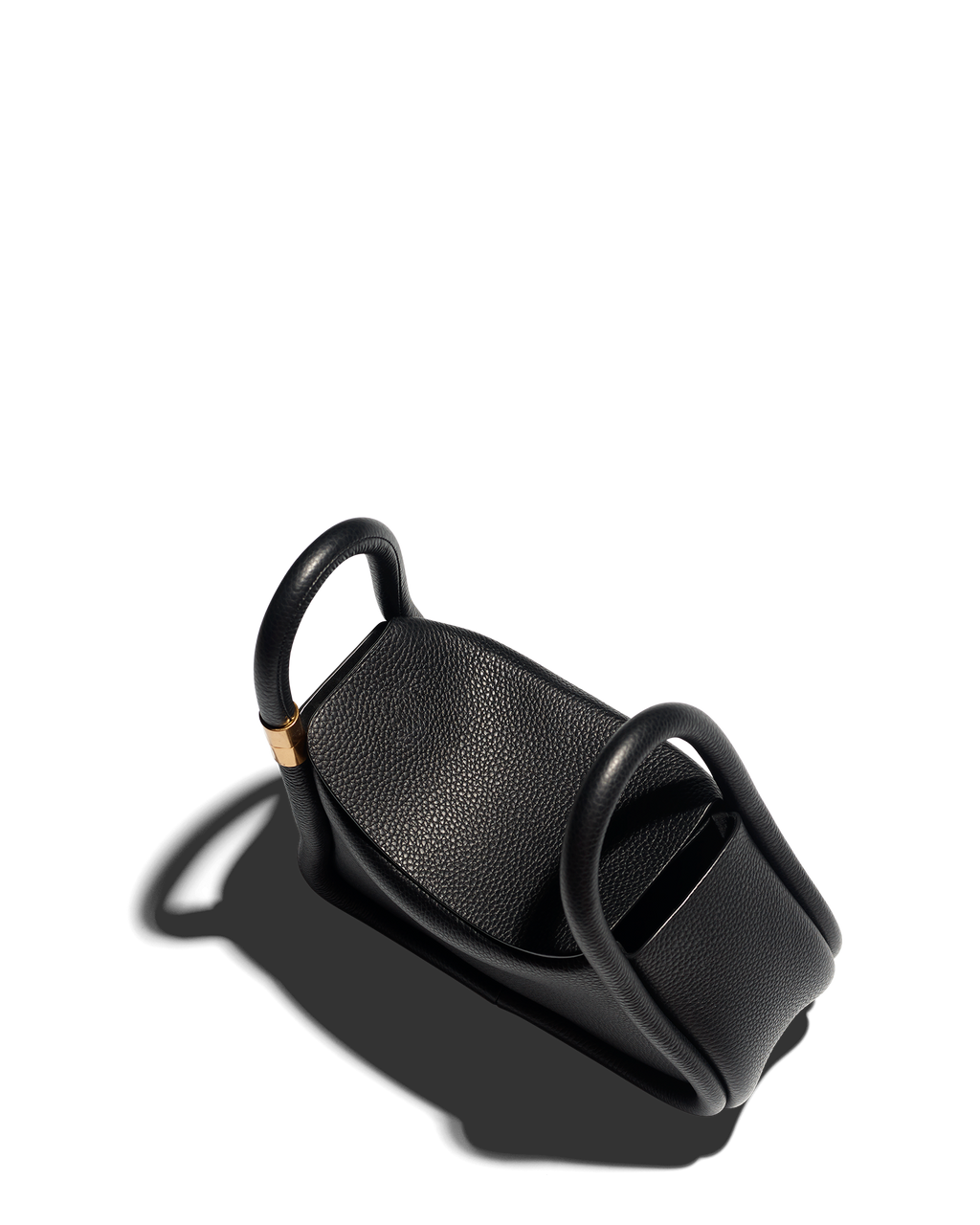 Black BOYY WONTON 20 handbag with a unique distorted silhouette in pebbled calfskin, calf suede lining, flap closures, detachable strap, brass twist fastener 3/4 top