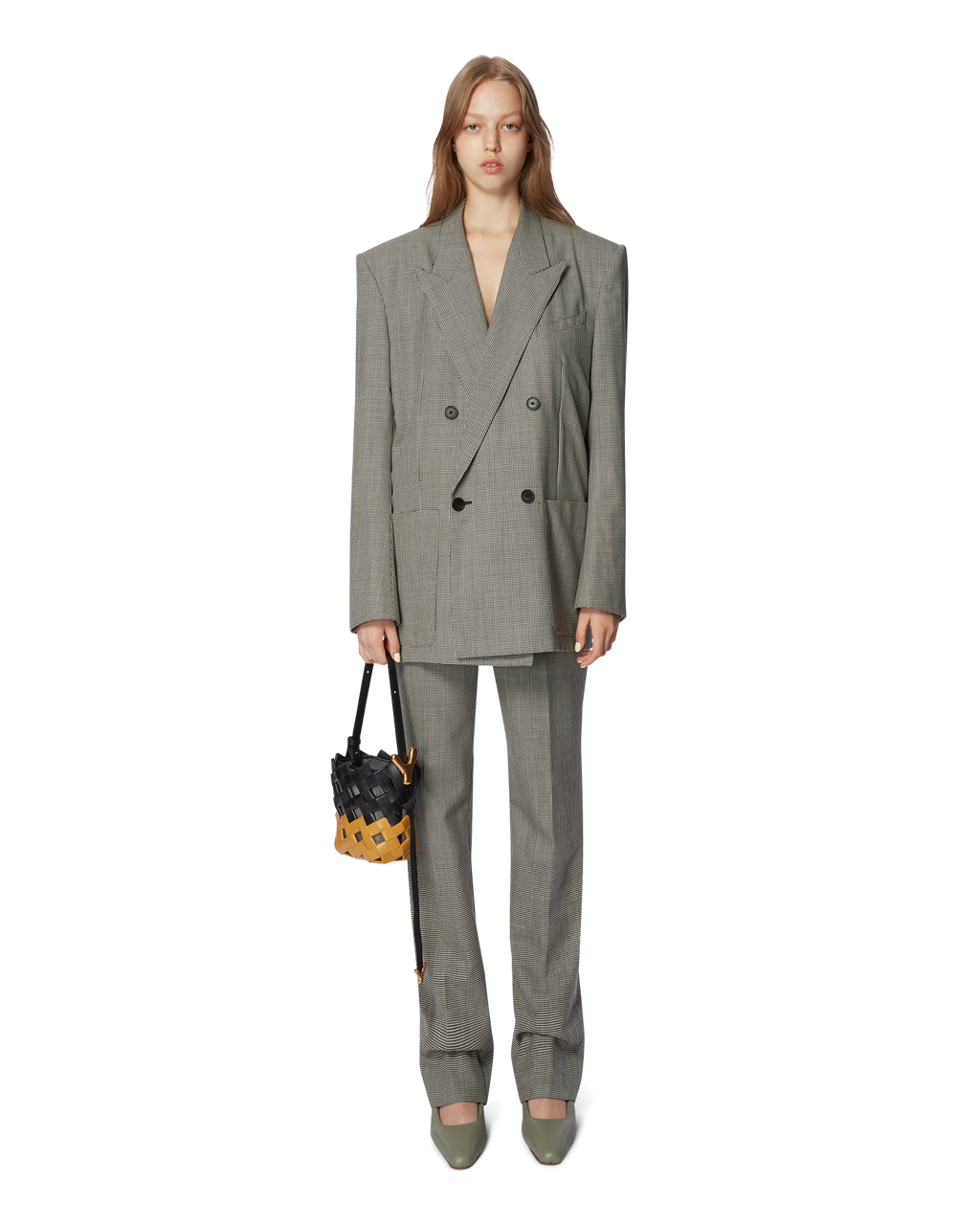 Amber black BOYY YY woven bucket bag, made of woven calfskin and suede, with a structured silhouette, featuring signature brass Y hardware on the side and an adjustable shoulder-to-crossbody strap on model
