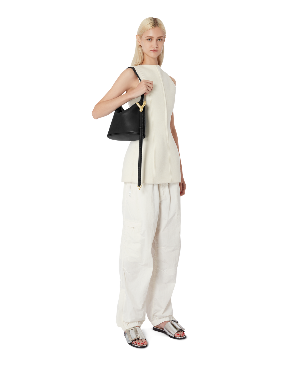 Black BOYY YY SAC made of supple calfskin leather with matte finish, slouchy hobo silhouette, featuring a flap closure with signature brass Y hardware and an adjustable shoulder-to-crossbody strap on model