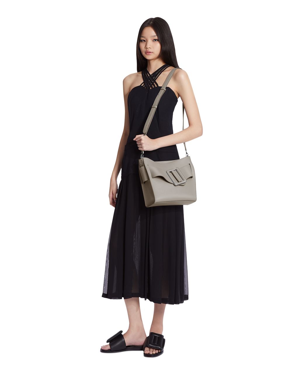 Gres beige BOYY DEVON 23 soft bag made of grain calfskin leather. Structured boxy silhouette with signature oversized belt with buckle. Detachable top handle and shoulder strap on model