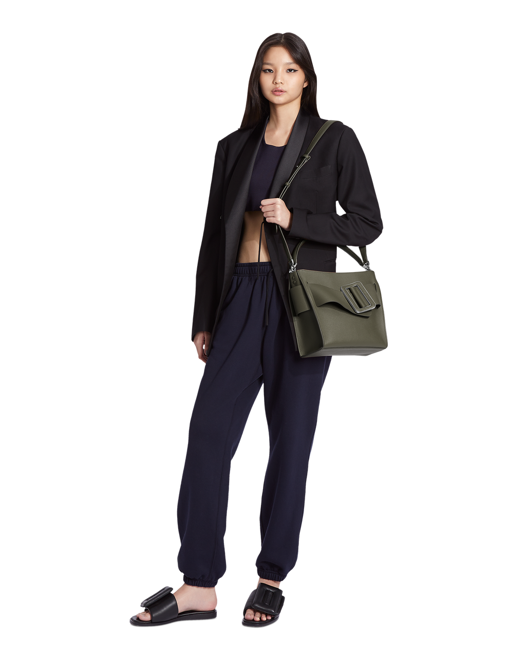 Hojicha green BOYY DEVON 23 soft bag made of grain calfskin leather. Structured boxy silhouette with signature oversized belt with buckle. Detachable top handle and shoulder strap on model